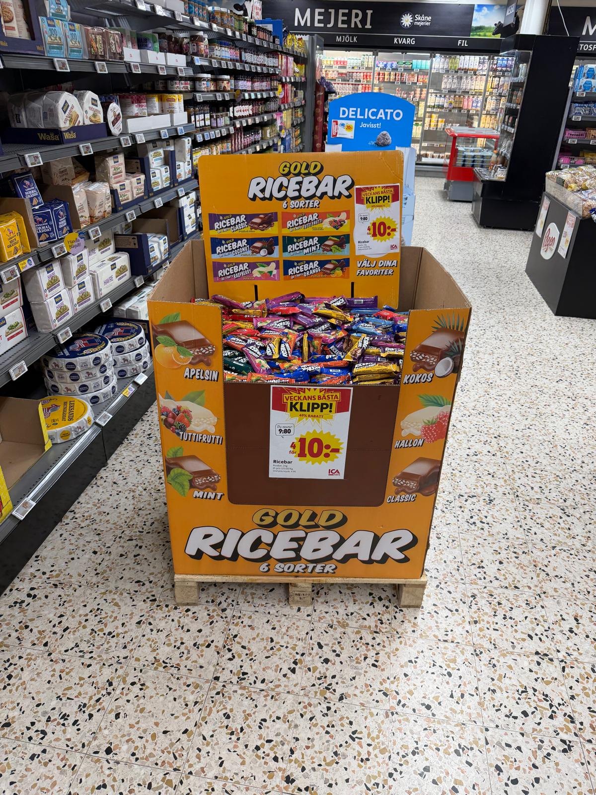 Gold Ricebar floor display in supermarket